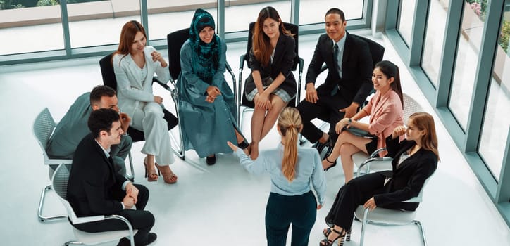 Businesswomen and businessmen attending group meeting conference in office room. Corporate business team concept. uds