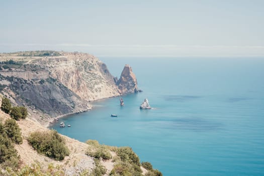 Aerial panoramic view of beautiful sunset above sea. Beautiful seascape. Sun glare, small waves on the water surface. Evening. Horizon. Nobody. No people. Copy space. Never-ending beauty of nature