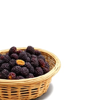 Dried mulberries in a rustic wicker basket deep purple with a soft texture a gentle. Food isolated on transparent background.