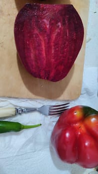 sweet red pepper, beets, vegetables food in the kitchen. High quality photo