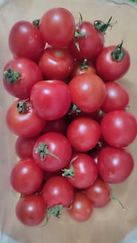 red fresh cherry tomatoes, vegetables food nature. High quality photo