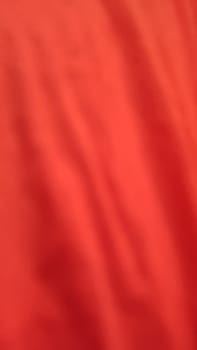 red background fabric clothing texture. High quality photo