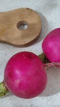 fresh radishes vegetables food, kitchen board. High quality photo