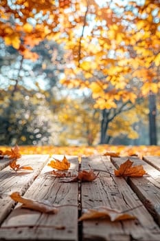 Wooden table in the autumn park. Selective focus. Nature.