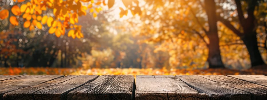 Wooden table in the autumn park. Selective focus. Nature.