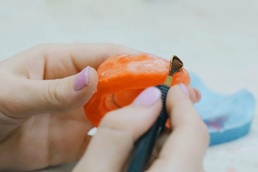 The dental technician makes a wax base and adds wax to form the mold. Dental concept