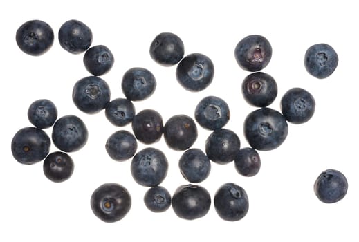 Blueberries lie in a stack on an isolated background, close up. Top view