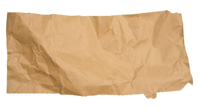 Torn piece of brown cardboard on a white isolated background, close up