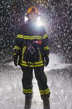 A determined female firefighter in a professional uniform striding through the dangerous, rainy night on a daring rescue mission, showcasing her unwavering bravery and commitment to saving lives