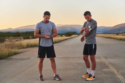 Group of handsome men running together in the early morning glow of the sunrise, embodying the essence of fitness, vitality, and the invigorating joy of embracing nature's tranquility during their refreshing and energizing workout