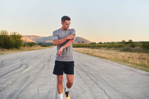 A young handsome man running in the early morning hours, driven by his commitment to health and fitness. High quality photo