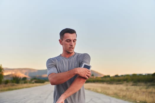 A young handsome man running in the early morning hours, driven by his commitment to health and fitness. High quality photo