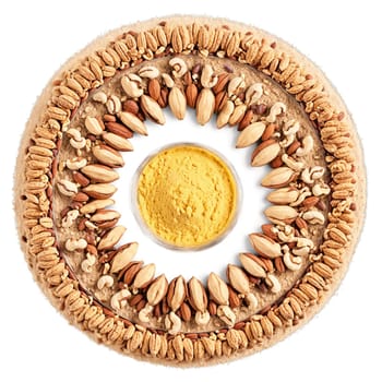 Karuka nut mandala an arrangement of whole karuka nuts karuka nut halves and karuka nut. Food isolated on transparent background.