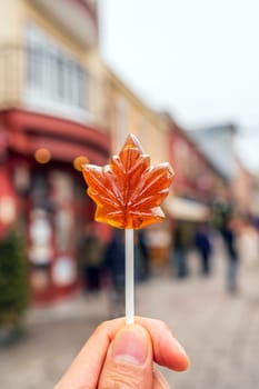 Maple syrup candy on stick in Quebec City, Canada