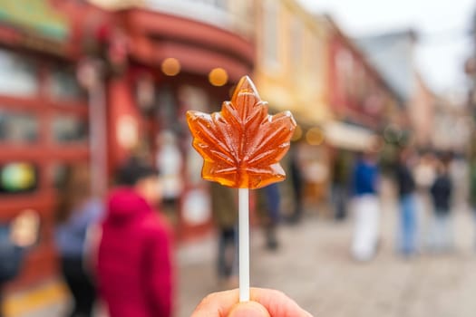 Maple syrup candy on stick in Quebec City, Canada