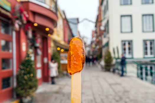 Maple syrup candy on stick in Quebec City, Canada