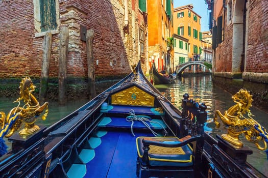 Venice cityscape and canal with gondola ride  in Italy