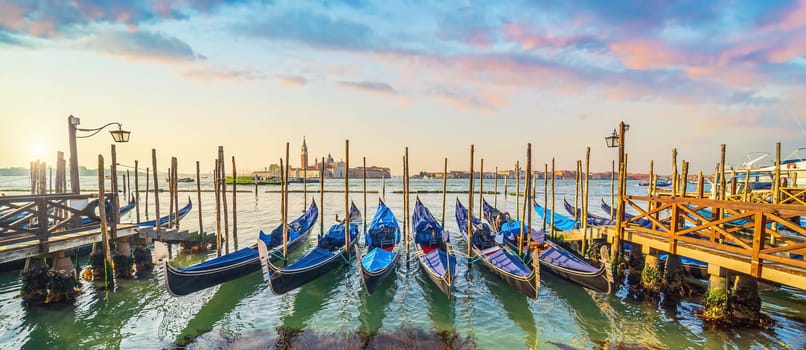 Venice cityscape and canal with gondolas  in Italy