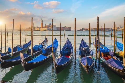 Venice cityscape and canal with gondolas  in Italy