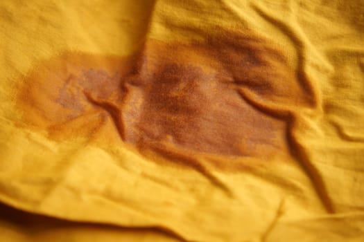 Oil stain on purple color cloth