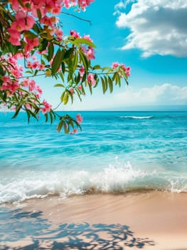 Waves gently kiss the shore under a cascade of pink blossoms, framing a tranquil tropical seascape under a sunny blue sky.