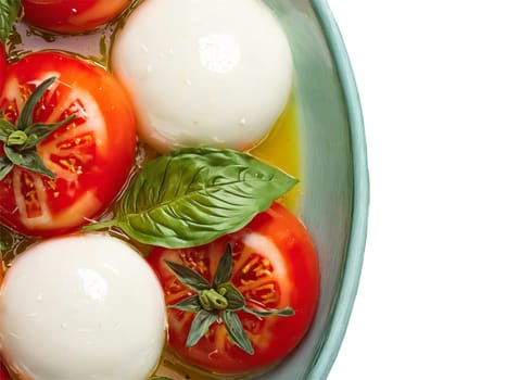 Salad caprese with ripe tomatoes fresh mozzarella and basil drizzled with olive oil served. Food isolated on transparent background.