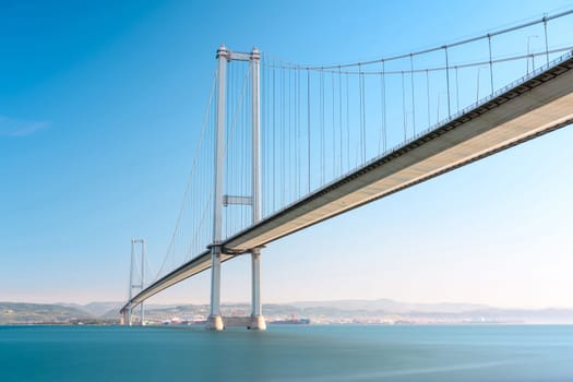 Osmangazi Bridge (Izmit Bay Bridge) located in Izmit, Kocaeli, Turkey. Suspension bridge captured with long exposure technique