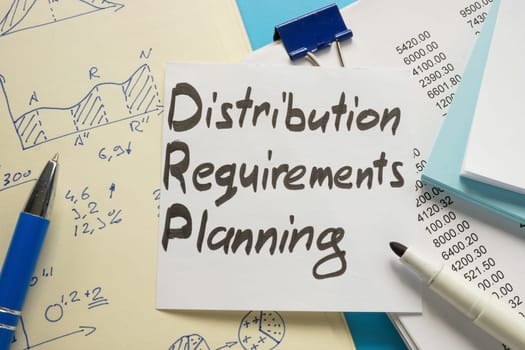 Distribution requirements planning DRP and papers with marks.