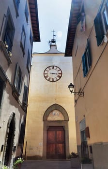 Empoli ,  Tuscany , facade of conventual church of Santo Stefano degli Agostiniani with wooden doorway