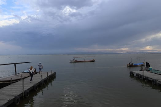 Natural Park of the Albufera in Valencia (Spain). Sunset in a cloudy day