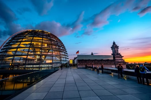 Berlin, Germany - 19 September 2020: Reichstag large glass dome and roof terrace at sunset