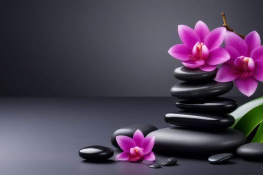 Spa gray background with massage stones, exotic flowers and copy space