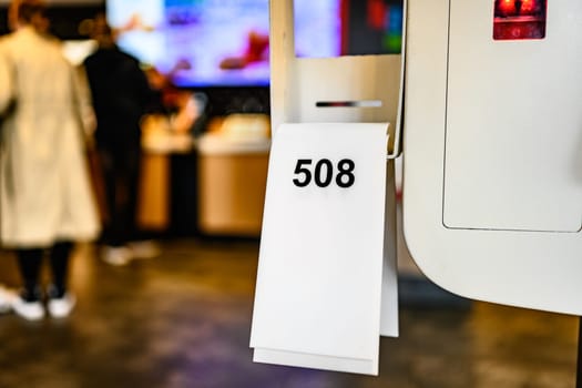 Berlin, Germany - 10 April 2023: numbers of orders on the self-order counter inside the McDonald's restaurant