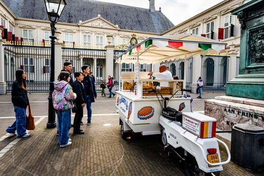 Hague, Netherland - 09 April 2023: candy trade on a square near the Royal Palace In The Center Of The Hague in Nederland