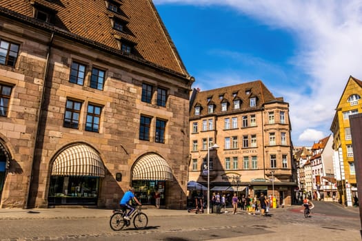 Nurnberg, Germany - 29 August 2022: Old city center in Nuremberg, Germany with ancient architecture buildings. Historical square in Bavaria, Europe with beautiful houses