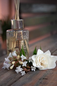 White jasmine flowers . Aromatherapy set. Rustic wooden background