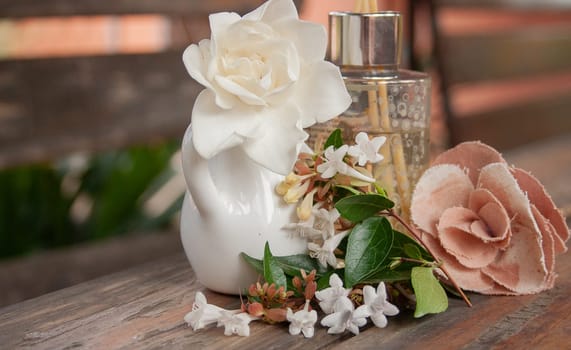 Aromatherapy set on rustic wooden background