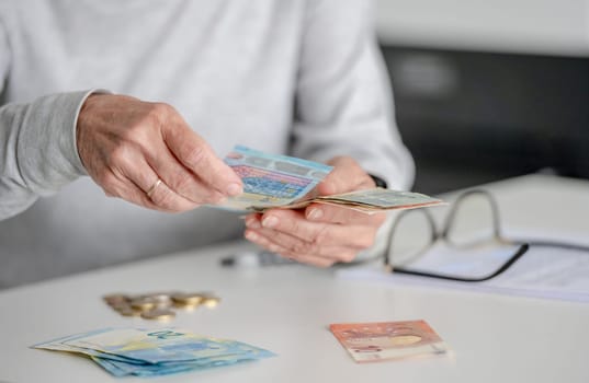 Elderly Woman'S Hands Count Money, Euros, In Close-Up View