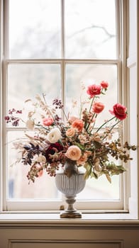 Beautiful floral arrangement with winter, autumn or early spring botanical plants and flowers