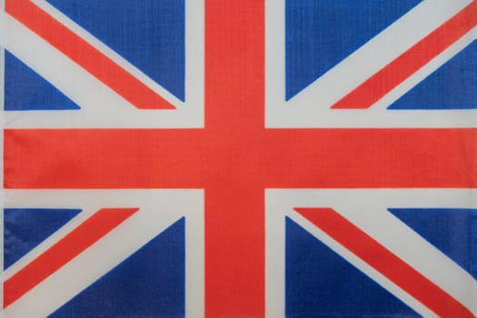 Union Jack Flag of Great Britain. Simple cloth fabric texture flag. High quality photo