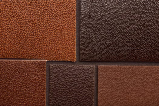 Intriguing close-up composition featuring various brown leather textures