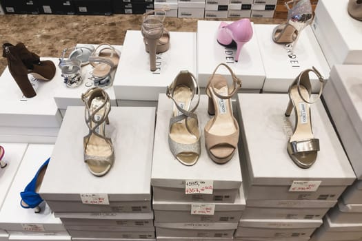 VERONA, ITALY- AUGUST 19, 2019: Jimmy Choo shoes in store with discounts on sale