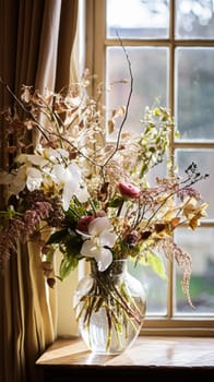 Beautiful floral arrangement with winter, autumn or early spring botanical plants and flowers