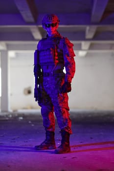 A professional soldier undertakes a perilous mission in an abandoned building illuminated by neon blue and purple lights.