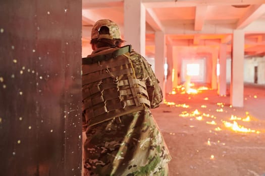 A group of professional soldiers bravely executes a dangerous rescue mission, surrounded by fire in a perilous building