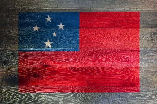 A Western Samoa flag on rustic old wood surface background