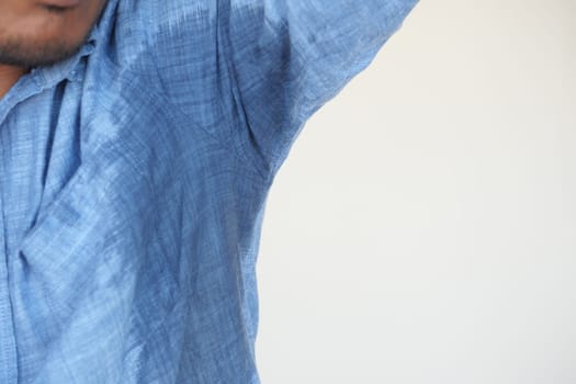 man with wet armpits Smelly odor from sweat