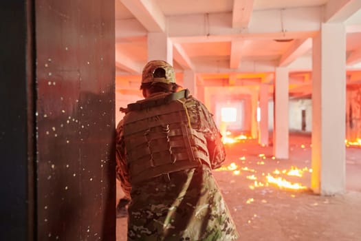 A group of professional soldiers bravely executes a dangerous rescue mission, surrounded by fire in a perilous building