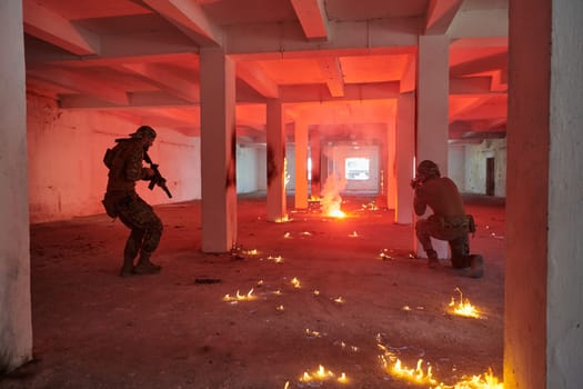 A group of professional soldiers bravely executes a dangerous rescue mission, surrounded by fire in a perilous building