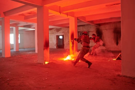 A group of professional soldiers bravely executes a dangerous rescue mission, surrounded by fire in a perilous building